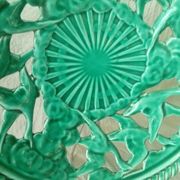 Twisted and pierced ceramic fruit bowl with a duck motif from the 1950s.