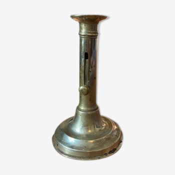 19th century brass candlestick says "to binet"