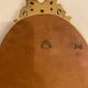 Golden oval wooden frame
