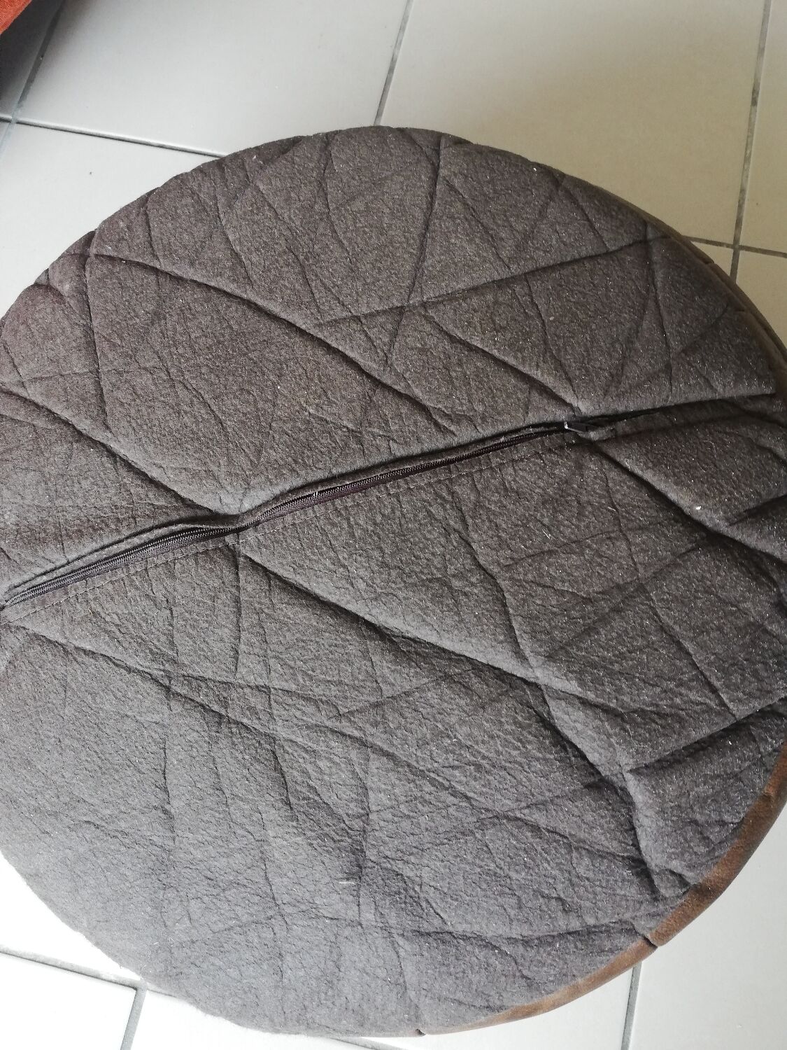 Brown round pouf imitation leather