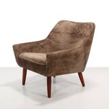 Danish design armchair in brown faux sheepskin