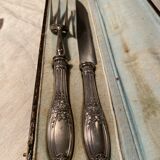 Fork and leg knife in a box