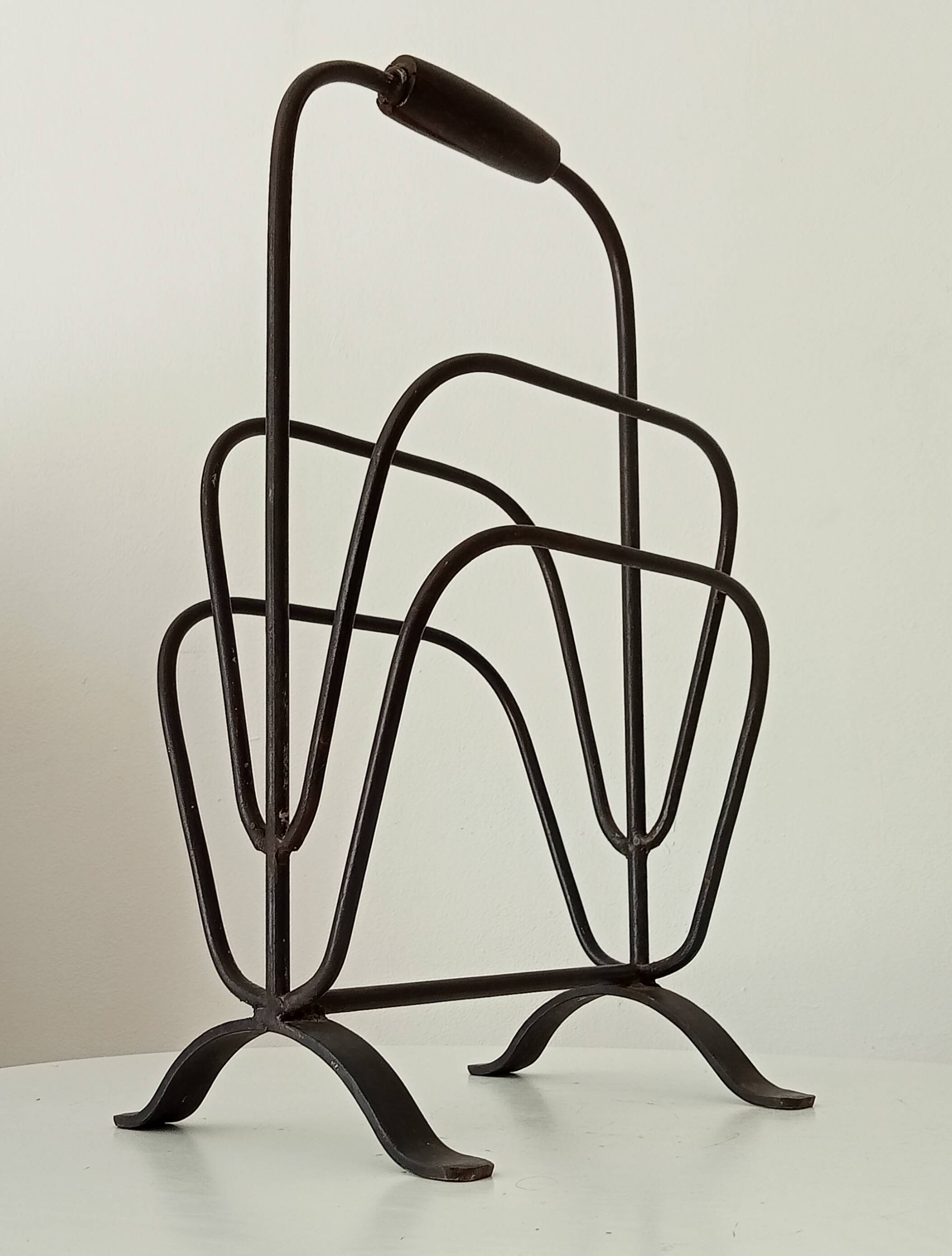 Brutalist wrought iron magazine rack from the 1960s.