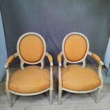 Pair of Louis XVI style medallion armchairs