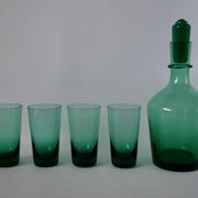 Set of a carafe and 4 designer glasses in green glass from the 70s