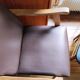 Paire de fauteuils moleskine marron