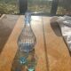 Liquor service consisting of a blue glass decanter and. 3 small antique glasses