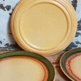 Six vintage stoneware plates with green net