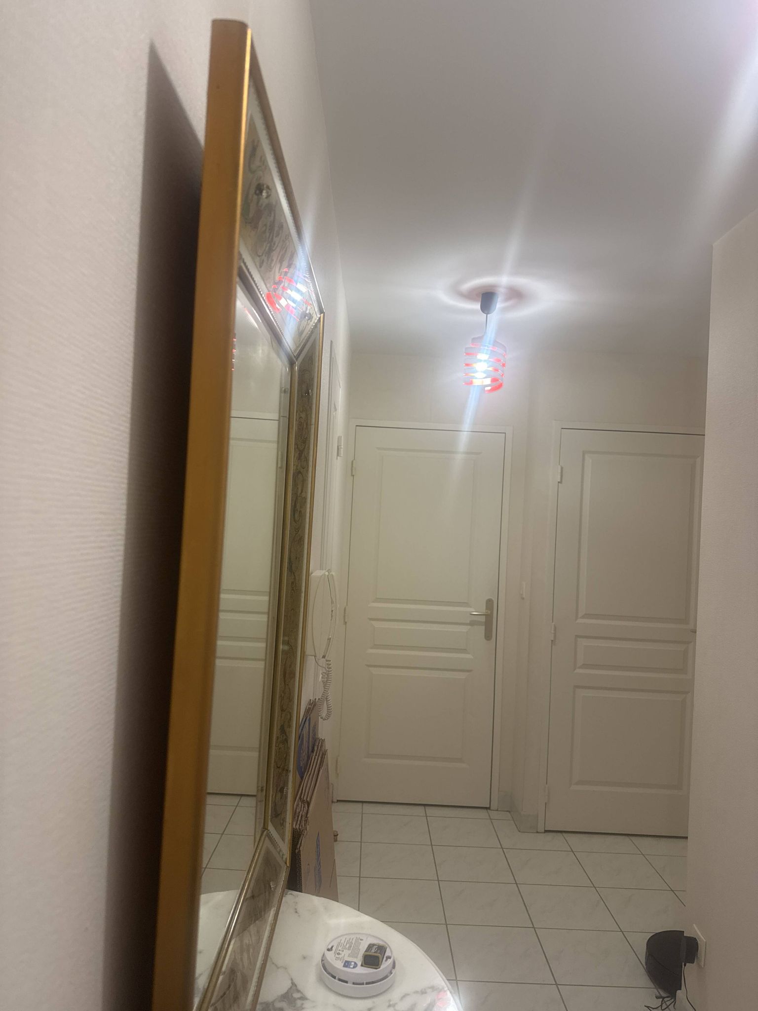 Grand Miroir avec encadrement doré