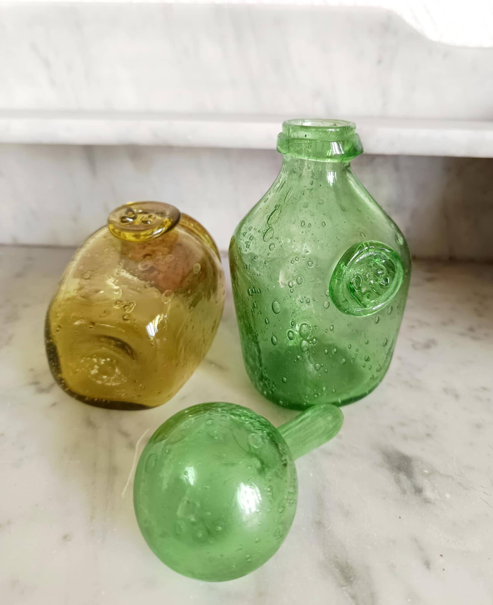 Two Biot bubble glass jars