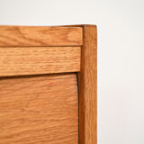 Oak sideboard with retractable doors