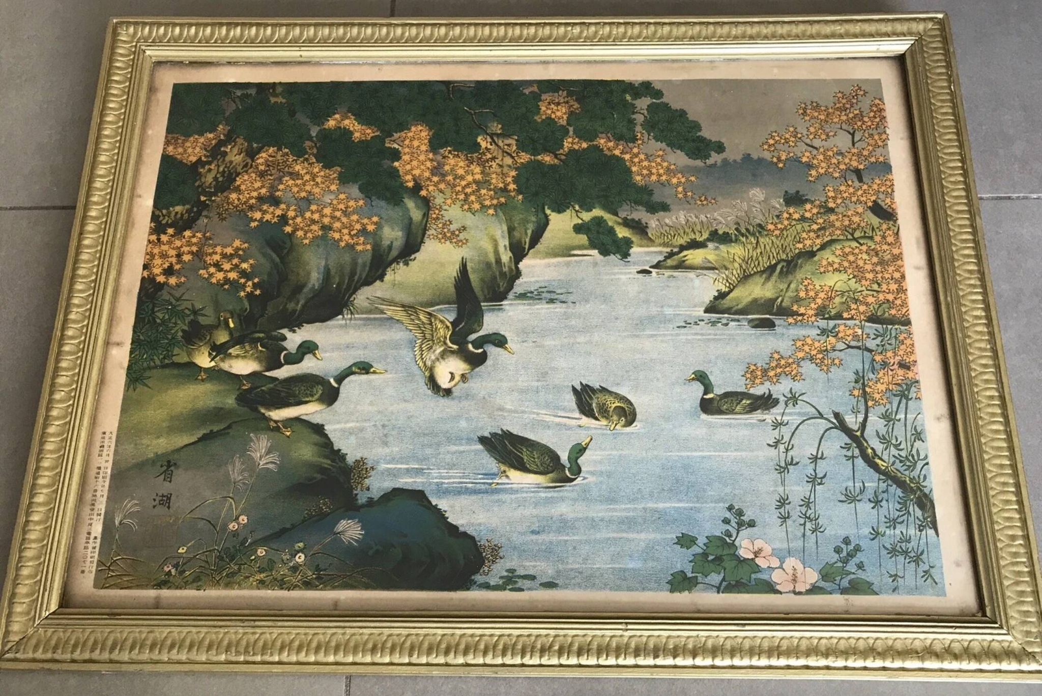 Old painting with a polychrome print decoration of ducks in nature.