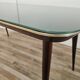 Mid-century mahogany dining table with aquamarine glass top