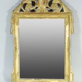 Superb Louis XVI style mirror in wood and gilded stucco nineteenth century