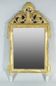 Miroir de style Louis XVI en bois et stuc doré XIXe siècle