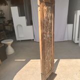 Rectangular Indonesian construction element with blue and yellow plant in carved wood