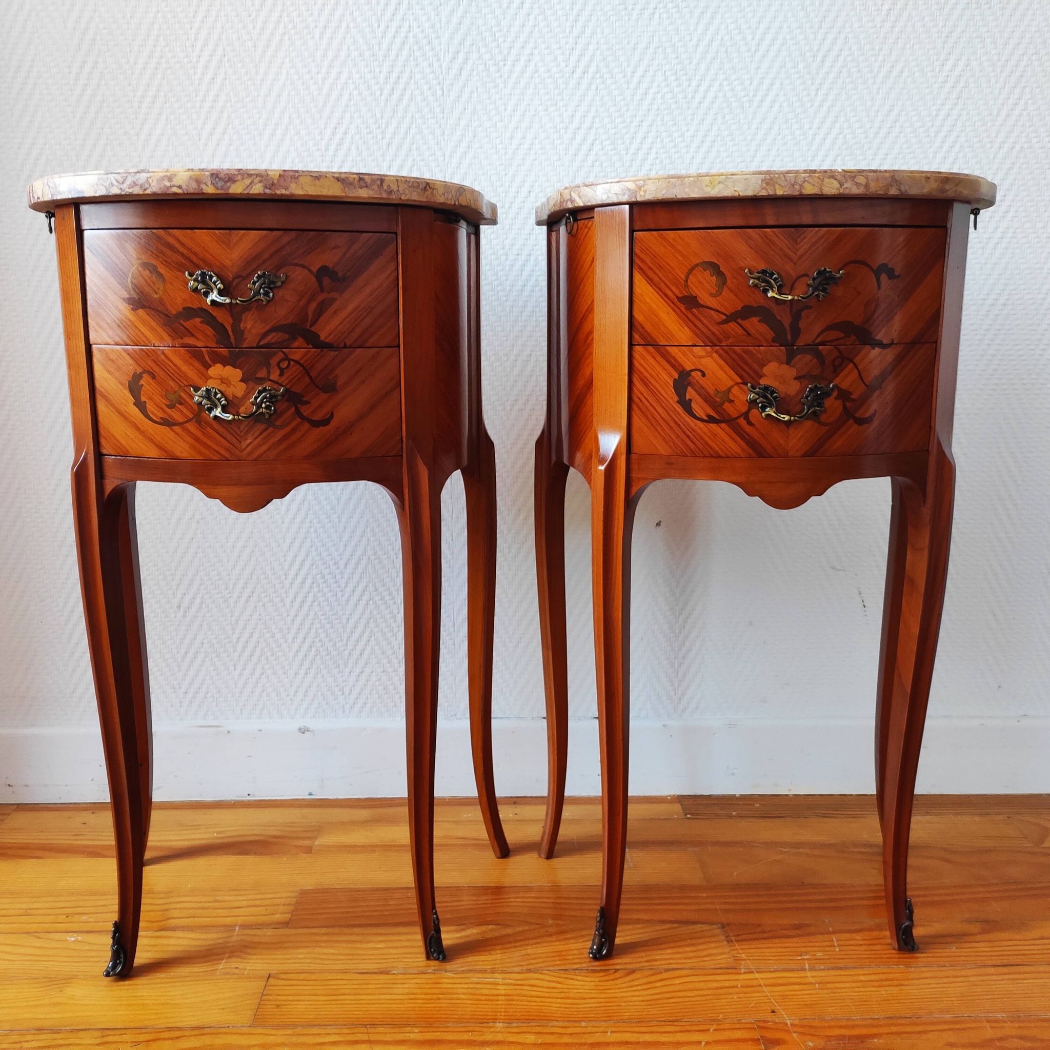 Pair of Louis XV style bedside tables with marquetry and marble.