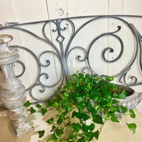 Old cast iron pediment door grille