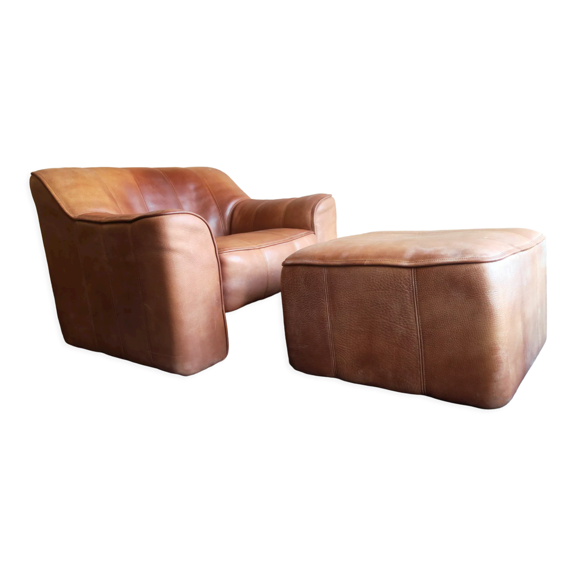 De Sede model DS44 patinated buffalo leather lounge chair and ottoman, 1970s