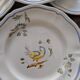 7 hand-painted earthenware dessert plates – France, 1950s