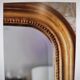 Antique Louis Philippe mirror, 19th century, mercury backing, wooden parquet back.