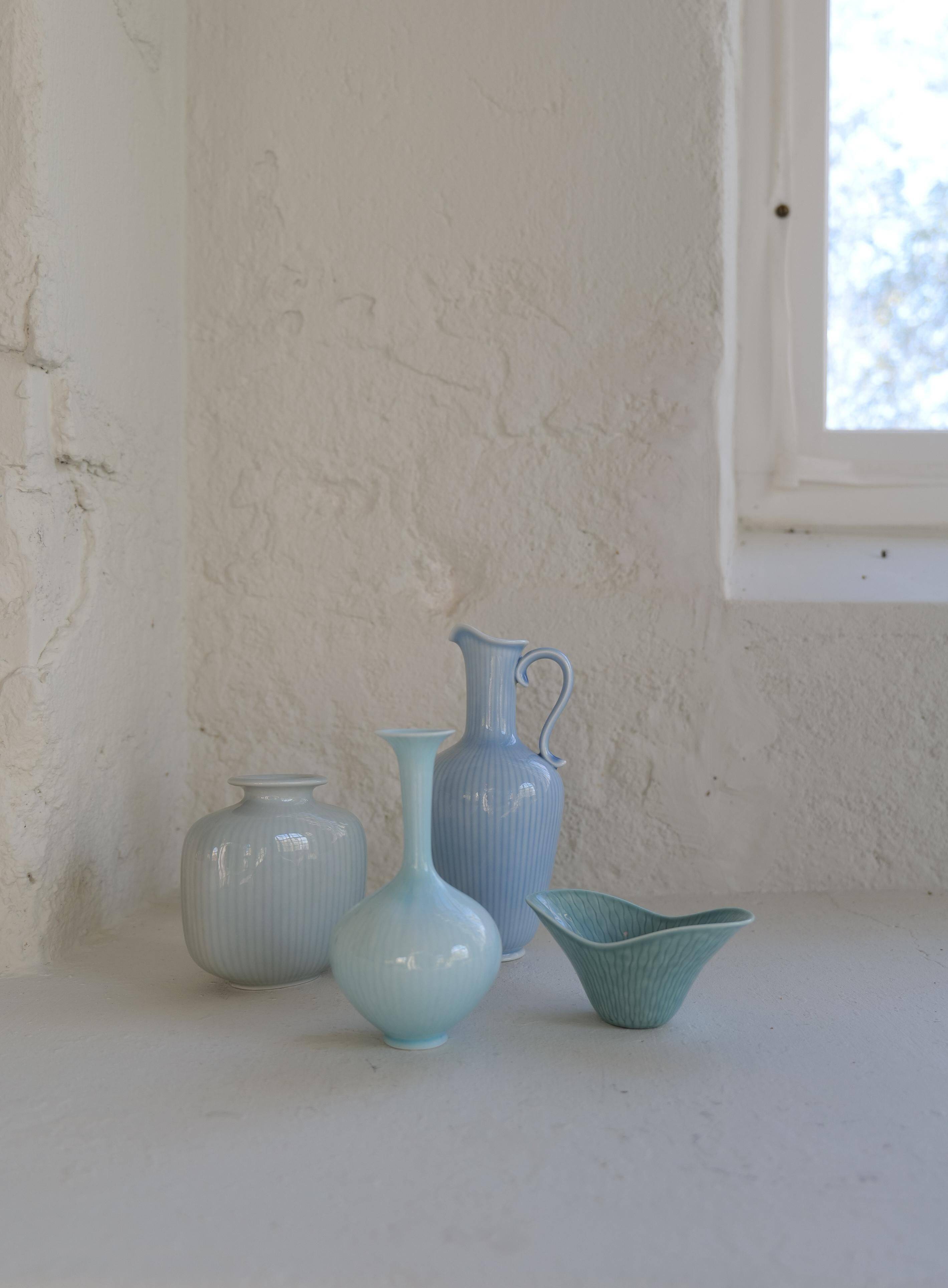 Mid-century modern set of 4 ceramic vases by Rörstrand, Gunnar Nylund, Sweden, 1950s.