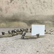 Set of 12 vintage knife rests, place card holders.