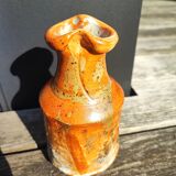 Vase orange en grès pyrité texturé