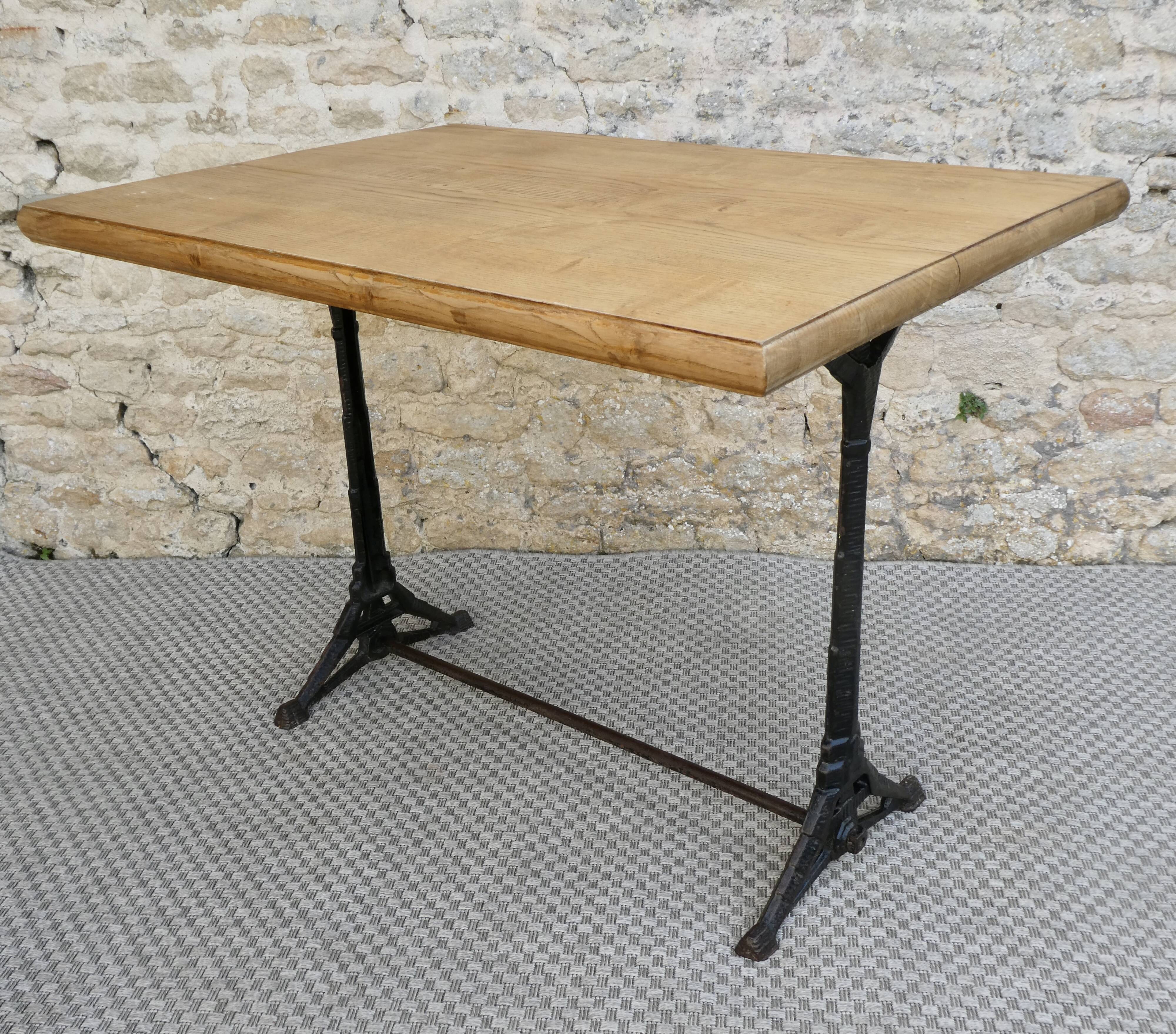 bistro table with cast iron legs signed Lelong, early 20th century