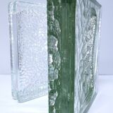 Two designer glass paving pockets