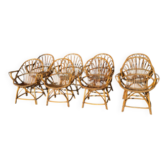 Set of 8 rattan armchairs from the 1960s, France.