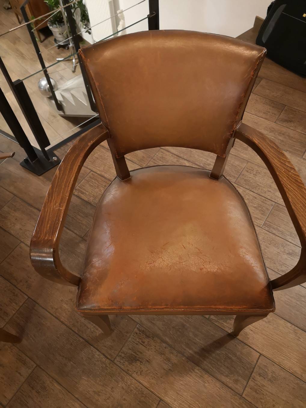 Club Bridge armchair in Bazane leather