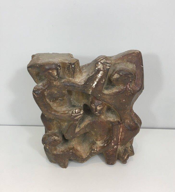 Plaster sculpture depicting a group of 3 figures