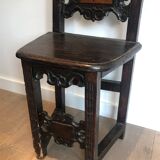 Set of an armchair and a pair of chairs in Italian Renaissance walnut