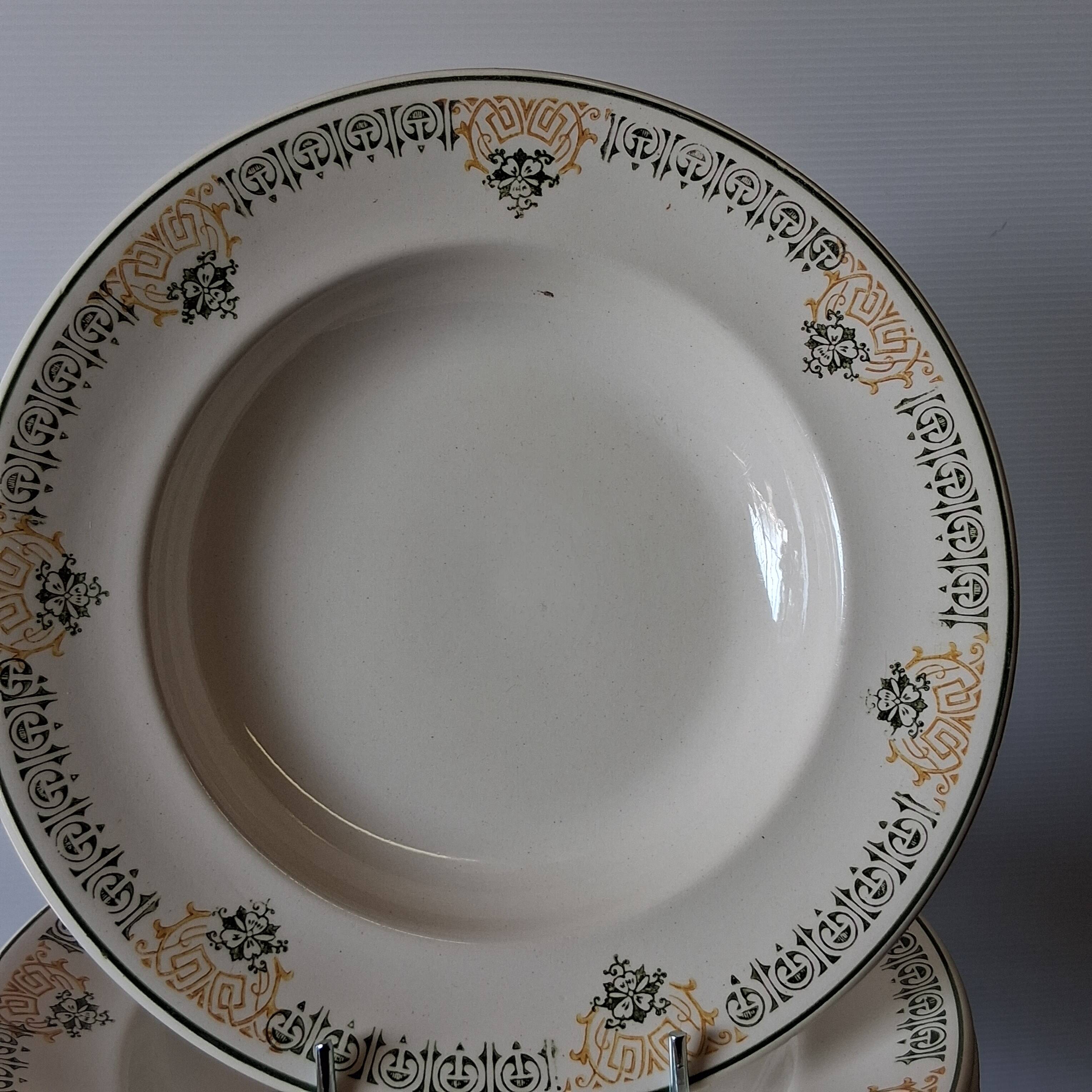 Set of 7 antique deep plates from Longwy, "Savigny" model, in good condition.