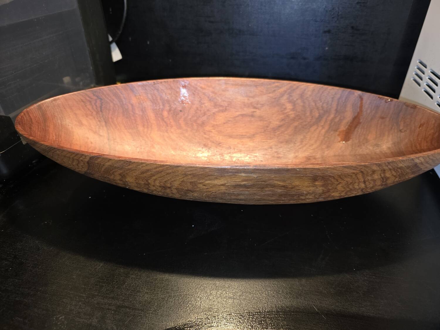 solid wood shuttle with a sleek and organic design.