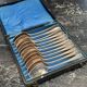 Box of 12 silver-plated dessert spoons in the Old Paris style.