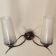 Two-light wall sconce in gilded metal with opaque glass shades, 1950/1960