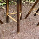 Set of three brutalist tripod stools