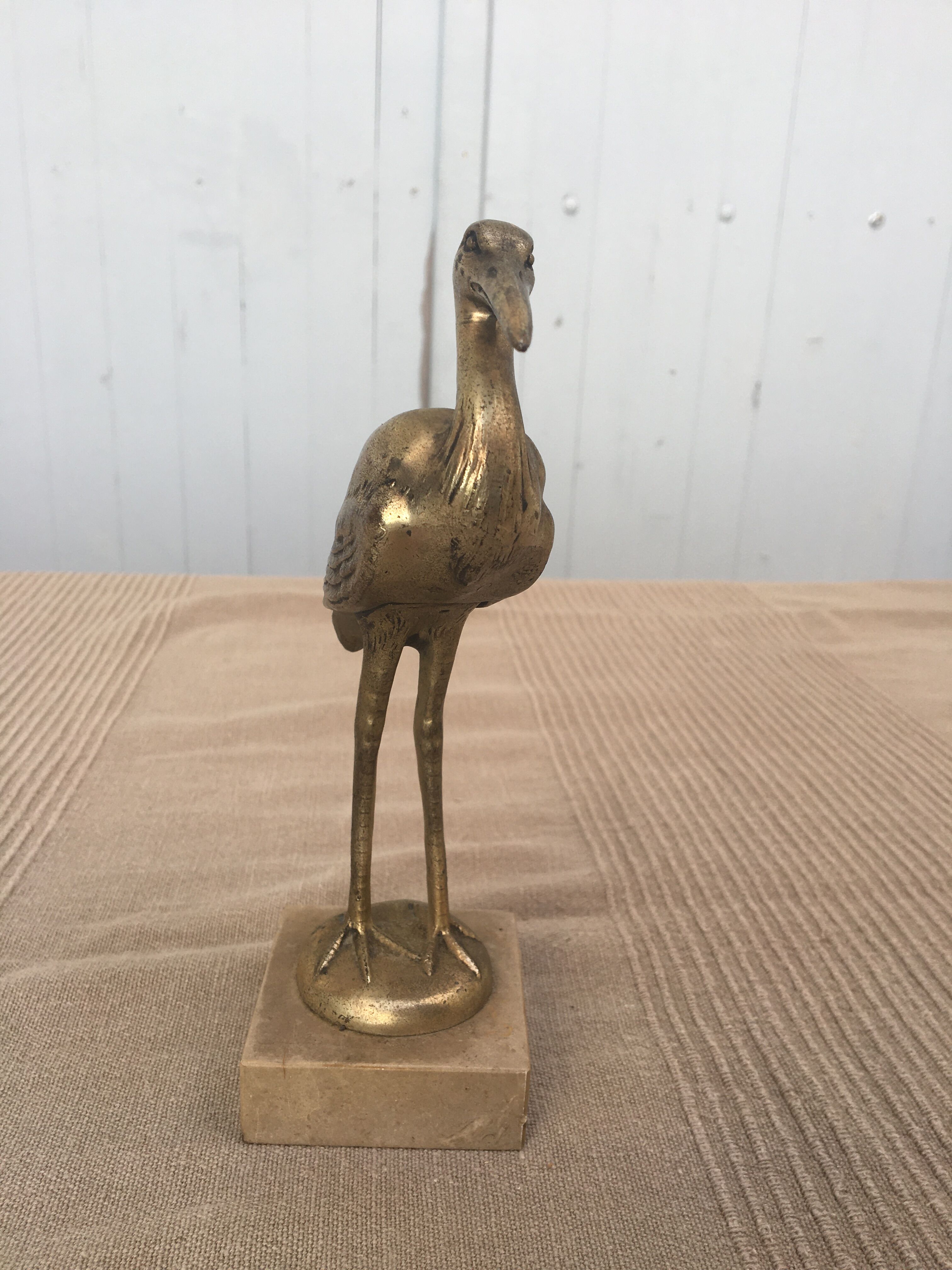 Heron brass statuette