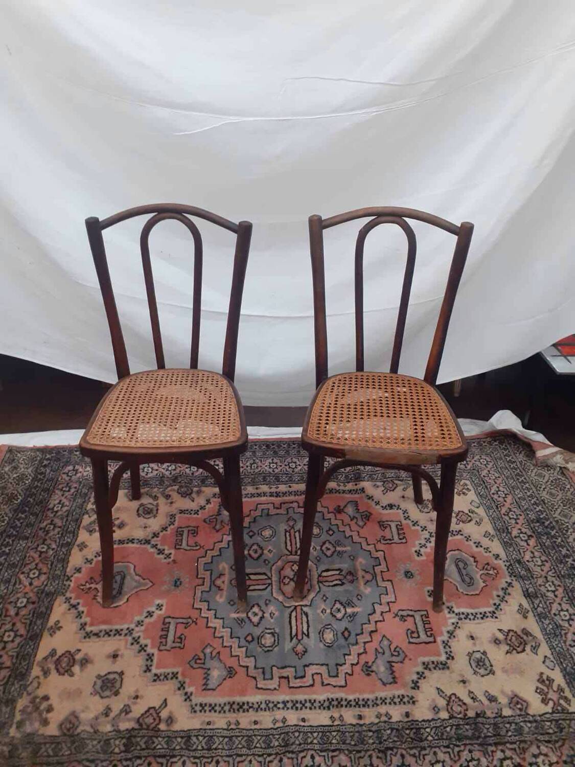 2 vintage caned bistro chairs