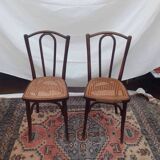 2 vintage caned bistro chairs