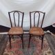 2 vintage caned bistro chairs