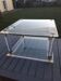 Vintage 1970s design glass and plexiglass coffee table.