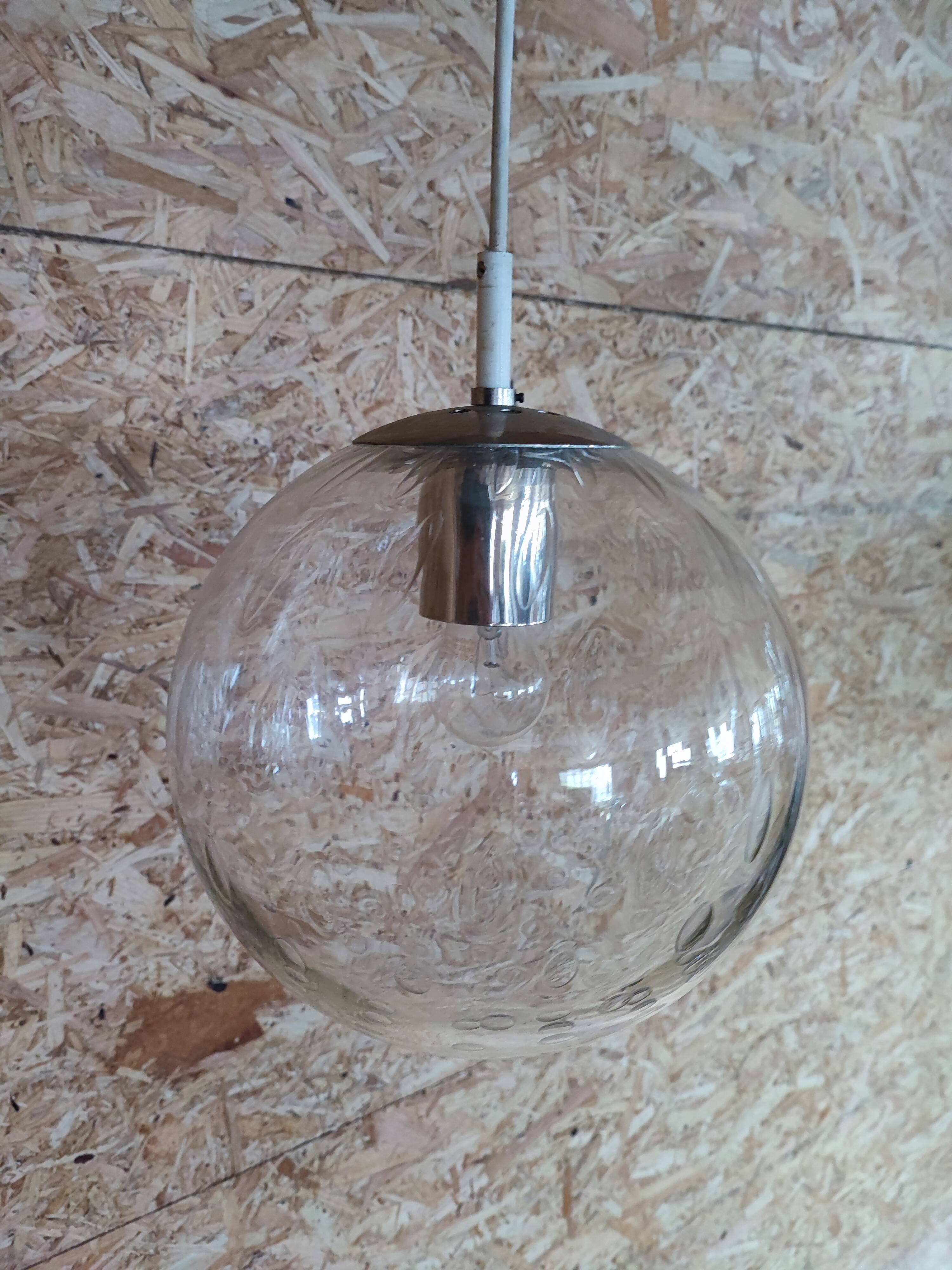 Bubbled glass globe pendant light. RAAK Amsterdam