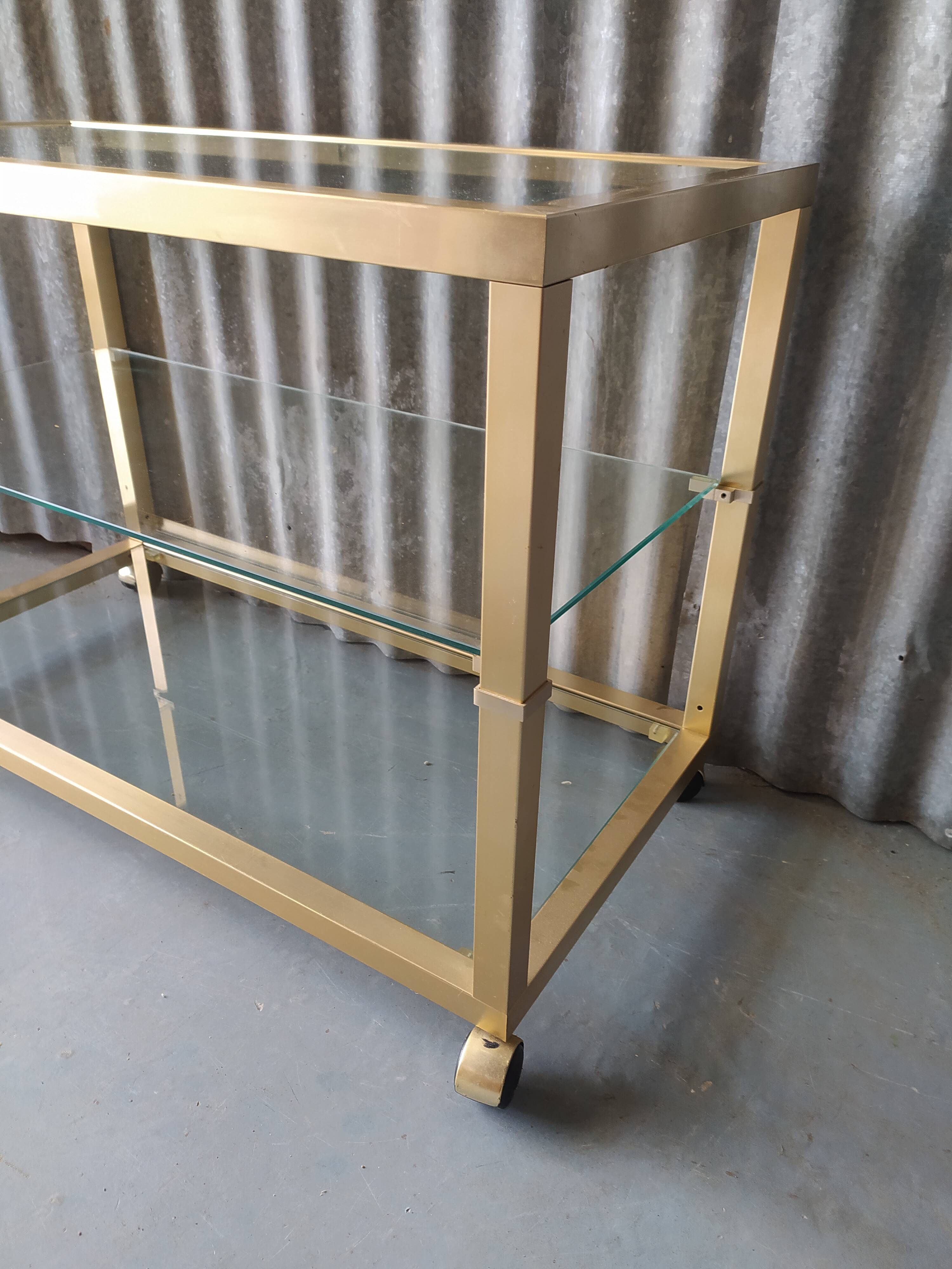 Table basse vintage metal doré et verre