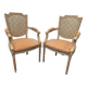 Pair of Louis XVI style armchairs in 20th century patinated beech