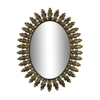 Oval mirror with golden metal acanthus leaves