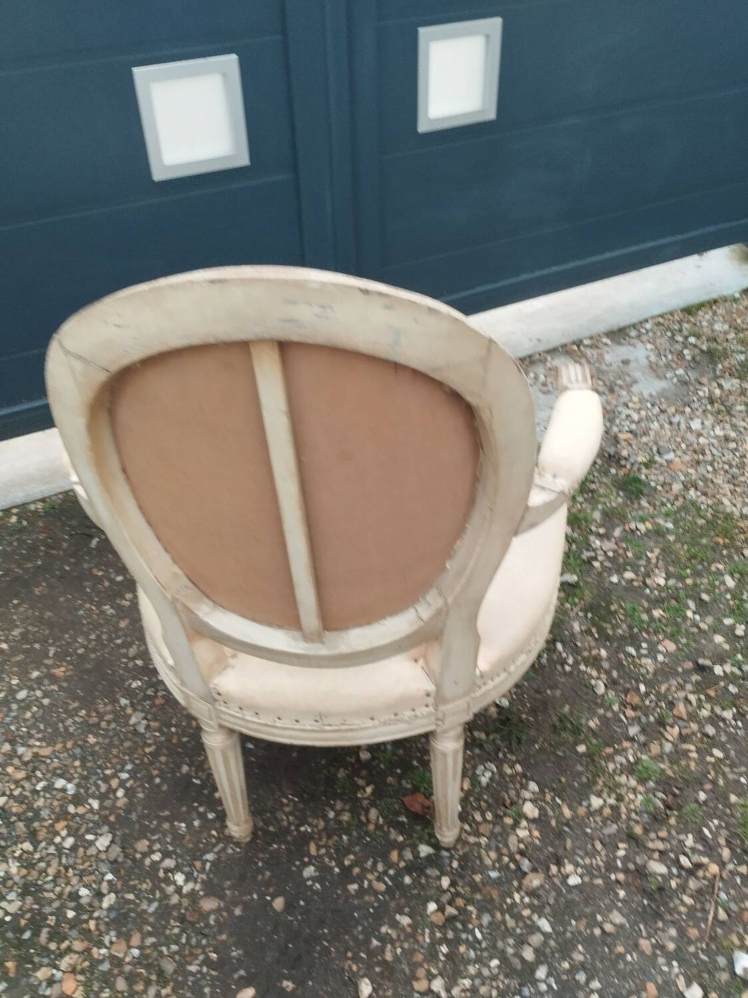 Antique armchair in Louis XVI style from the late 19th century.