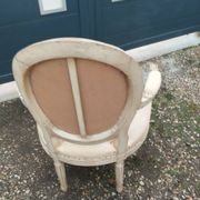 Antique armchair in Louis XVI style from the late 19th century.